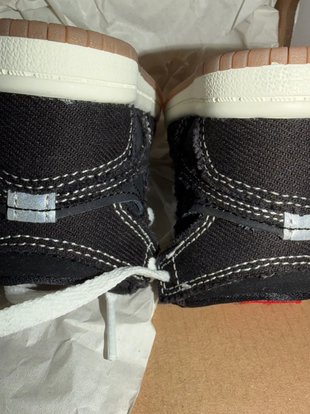 Nike Kids Black and White High-Top Sneakers with Red Accent